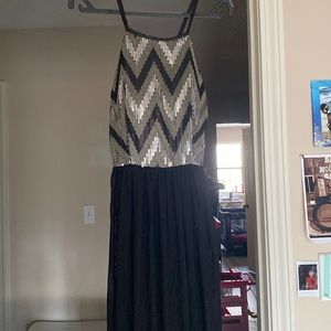 Size 6 black evening gown/long/brand name is Langhem